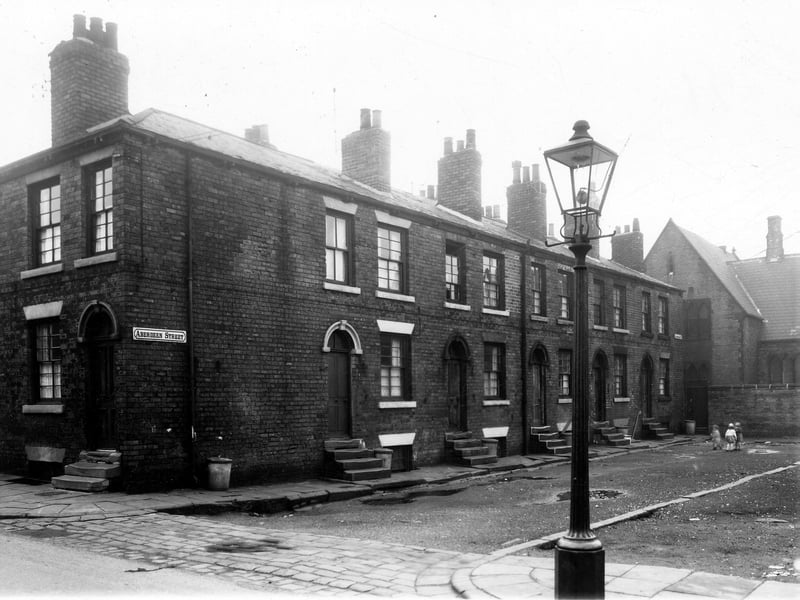 Number 34 Lloyd Street is on the left. Moving right is number 1 Aberdeen Street, followed by numbers 3 to 9. At the end of the street, St. Simons School is in view, it was situated on Ventnor Street. Pictured in December 1959.