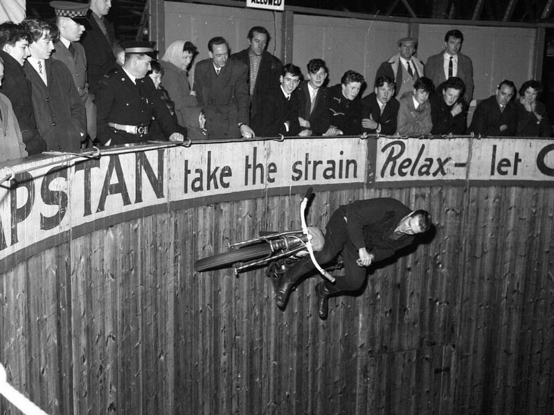Wall of death rider Cliff Codey in action at a carnival held at Waverley Market in 1962.