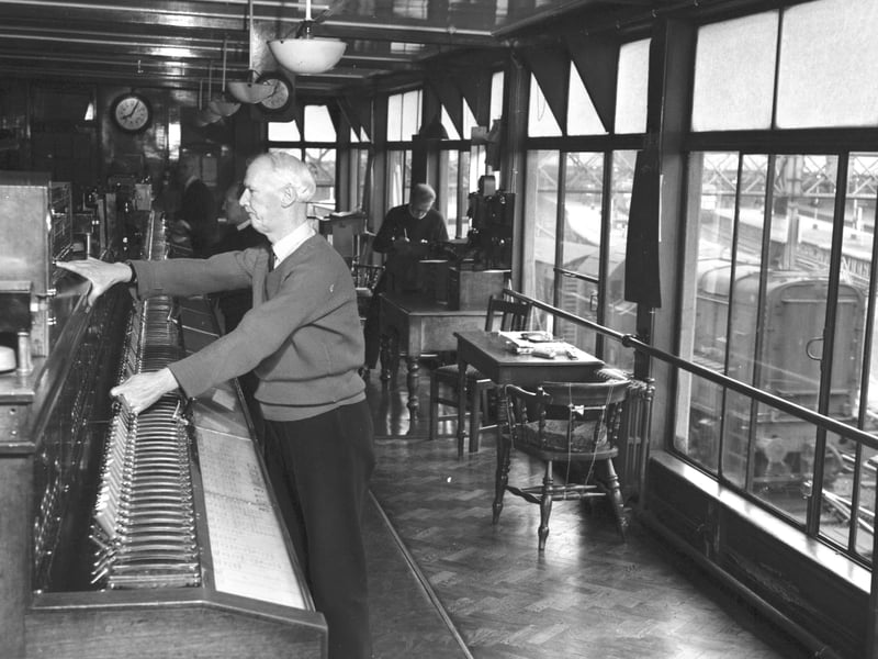 Mr W Stott operates the signal control box at Waverley Station in April 1966.