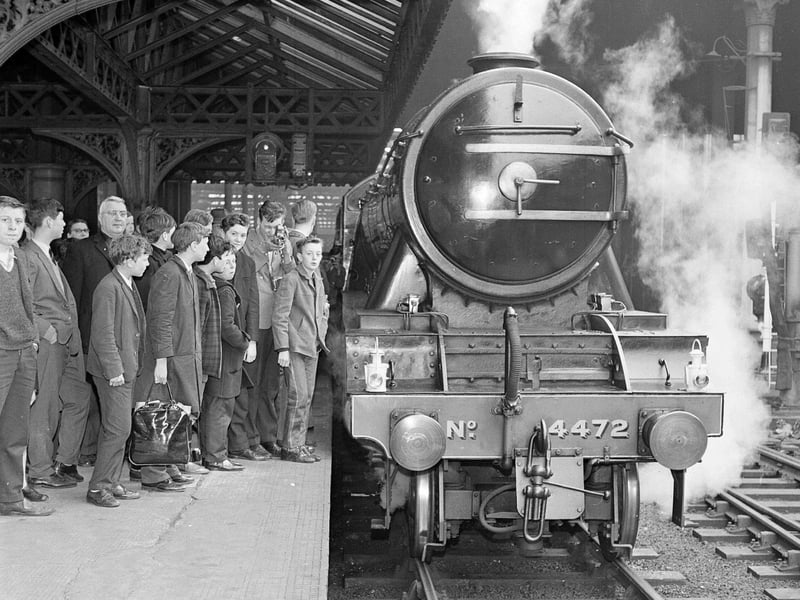 Crowds gather to see the Flying Scotsman when she leaves Waverley station in Edinburgh for Aberdeen in May 1964