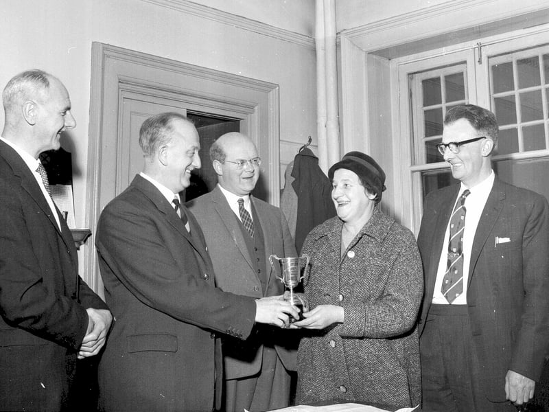Miss Janet Oldham and Mr D Louden receive the Alice Cleary Trophy for winning the Waverley Station Ambulance Company First Aid Competition in December 1962.