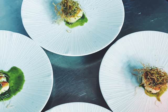 Tables fill with diners settling in for either a four-course or seven-course tasting menu – a culinary journey that moves from house-made bread through vegetarian dishes and seafood to meat courses, followed by pre-dessert and dessert.
