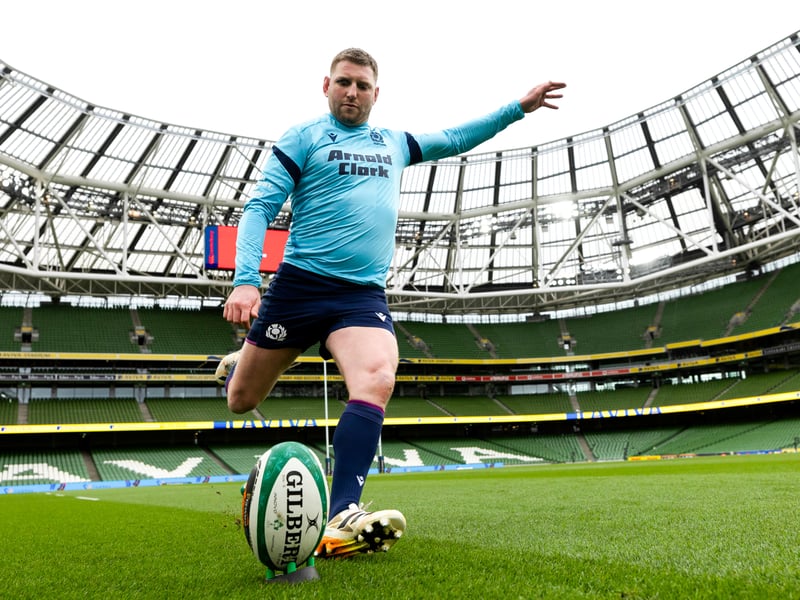Finn Russell practises his kicking.