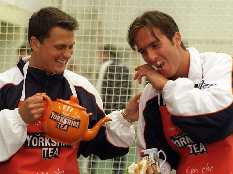 Tea and cakes. Darren Gough plays the fool with Michael Vaughan at the Yorkshire CCC photo-call in April 1999.