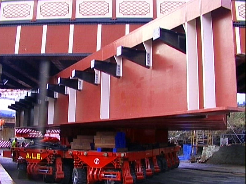 A new bridge deck being positioned prior to installation on  Globe Road in December 1999.