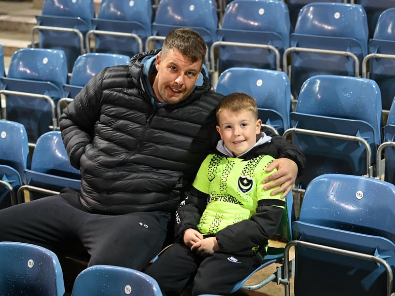 Brilliant photos of Pompey fans under the lights at Fratton Park against Derby County on Monday.