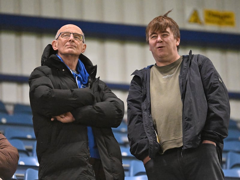 Brilliant photos of Pompey fans under the lights at Fratton Park against Derby County on Monday.