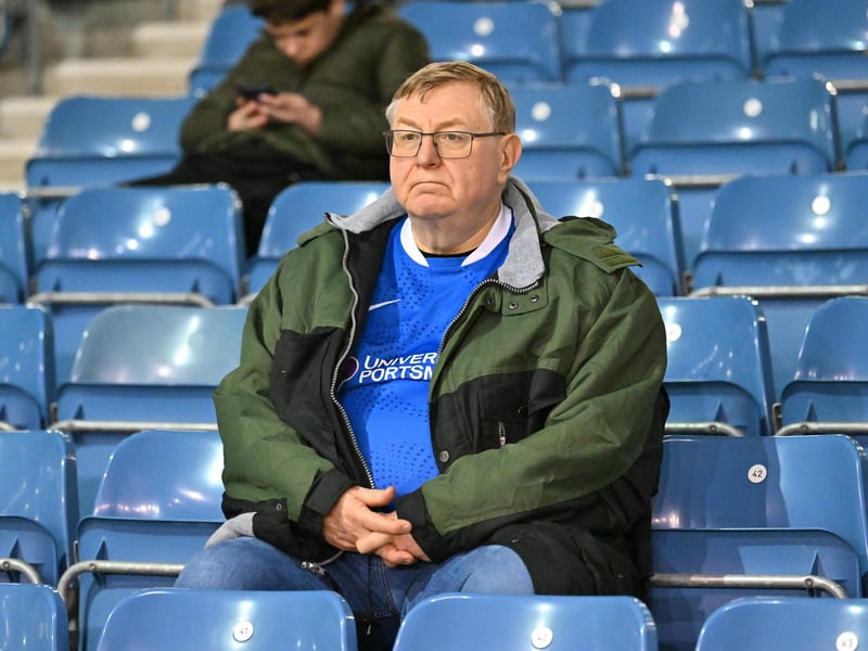 Brilliant photos of Pompey fans under the lights at Fratton Park against Derby County on Monday.