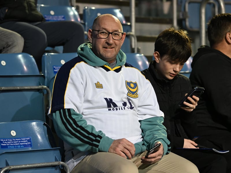Brilliant photos of Pompey fans under the lights at Fratton Park against Derby County on Monday.