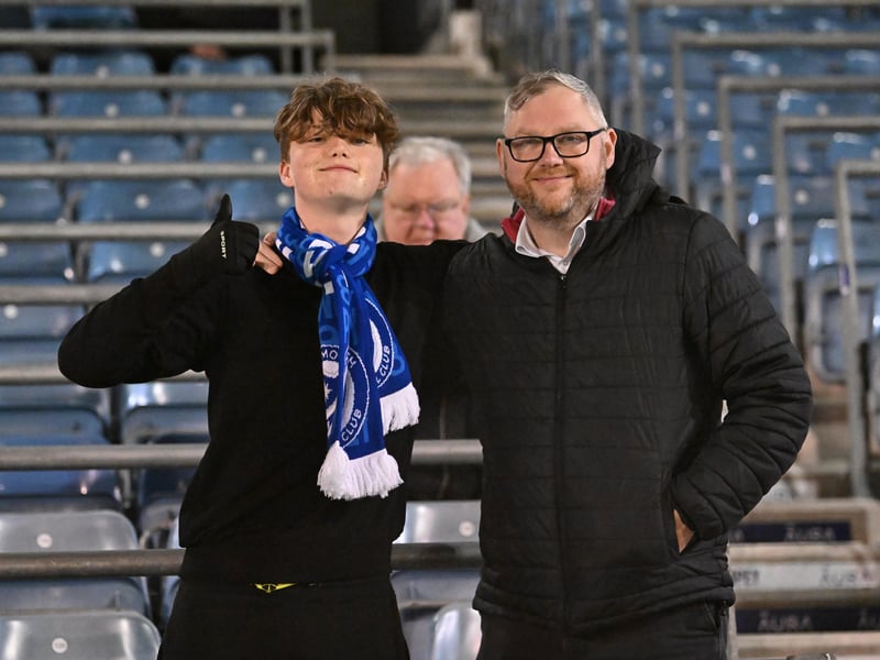Brilliant photos of Pompey fans under the lights at Fratton Park against Derby County on Monday.