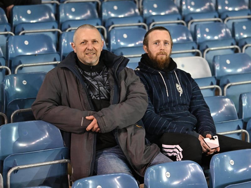Brilliant photos of Pompey fans under the lights at Fratton Park against Derby County on Monday.
