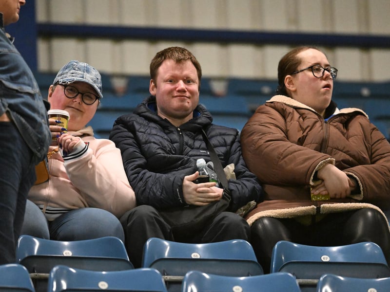 Brilliant photos of Pompey fans under the lights at Fratton Park against Derby County on Monday.
