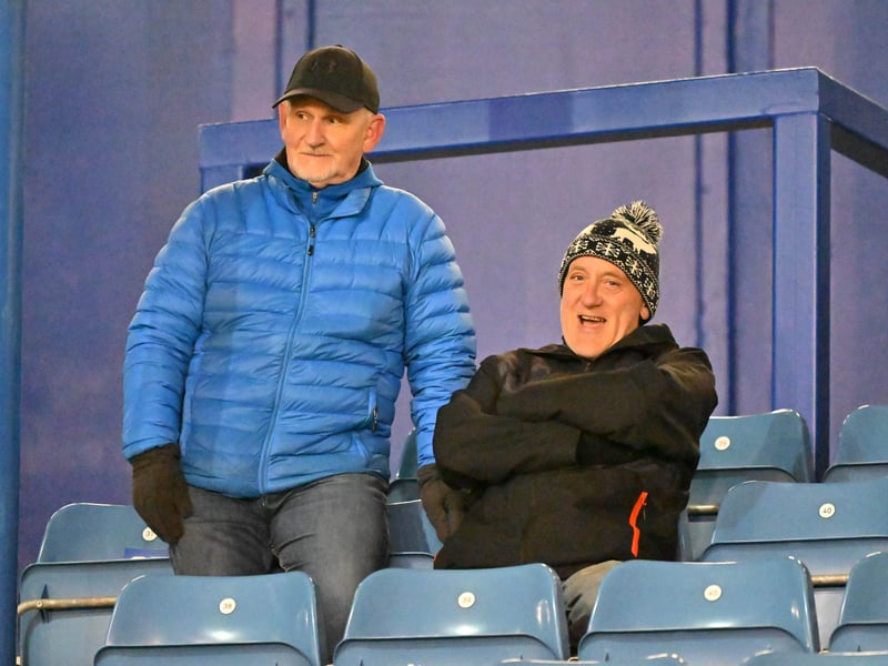 Brilliant photos of Pompey fans under the lights at Fratton Park against Derby County on Monday.