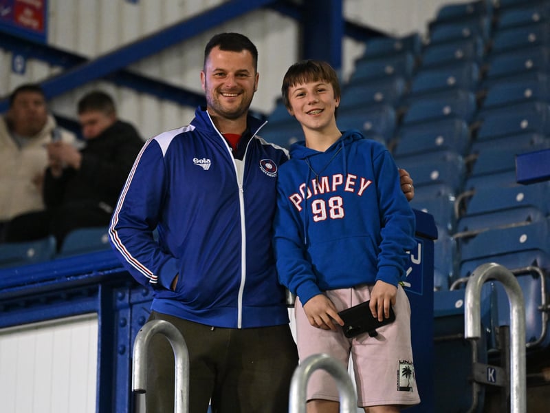 Brilliant photos of Pompey fans under the lights at Fratton Park against Derby County on Monday.