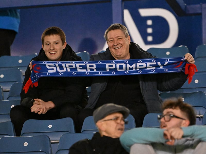 Brilliant photos of Pompey fans under the lights at Fratton Park against Derby County on Monday.