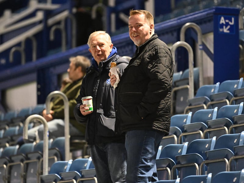 Brilliant photos of Pompey fans under the lights at Fratton Park against Derby County on Monday.