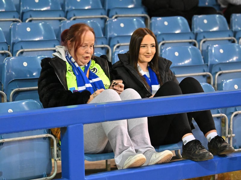 Brilliant photos of Pompey fans under the lights at Fratton Park against Derby County on Monday.