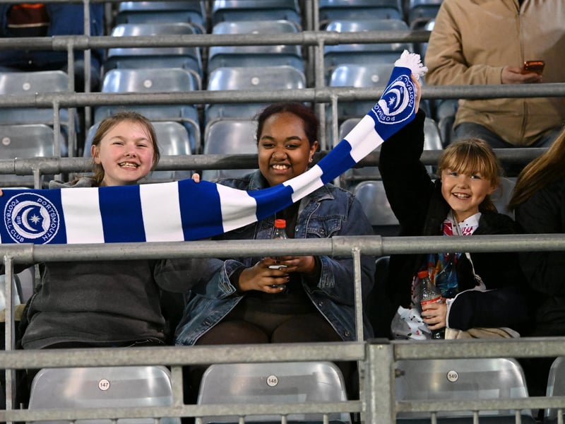Brilliant photos of Pompey fans under the lights at Fratton Park against Derby County on Monday.
