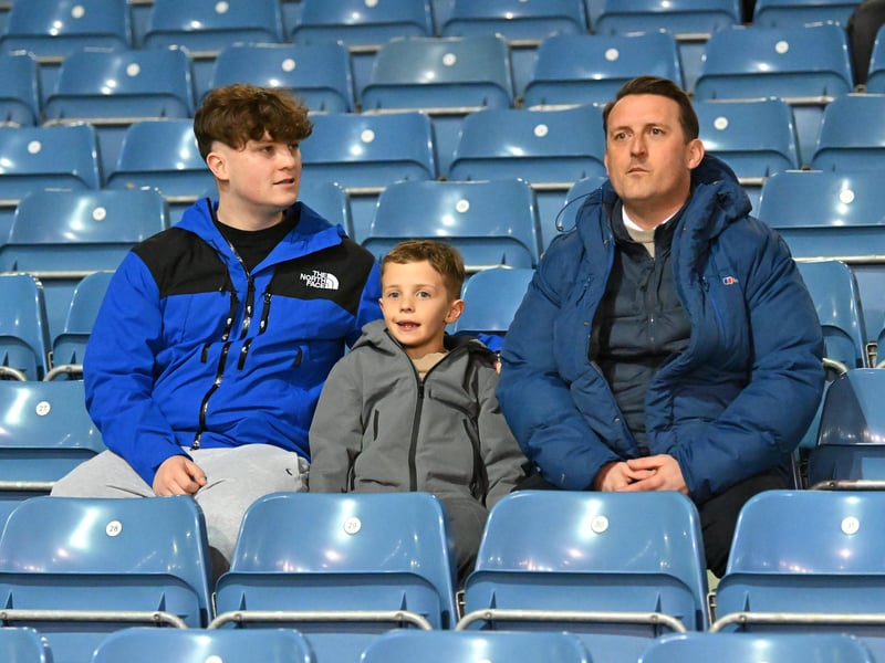 Brilliant photos of Pompey fans under the lights at Fratton Park against Derby County on Monday.