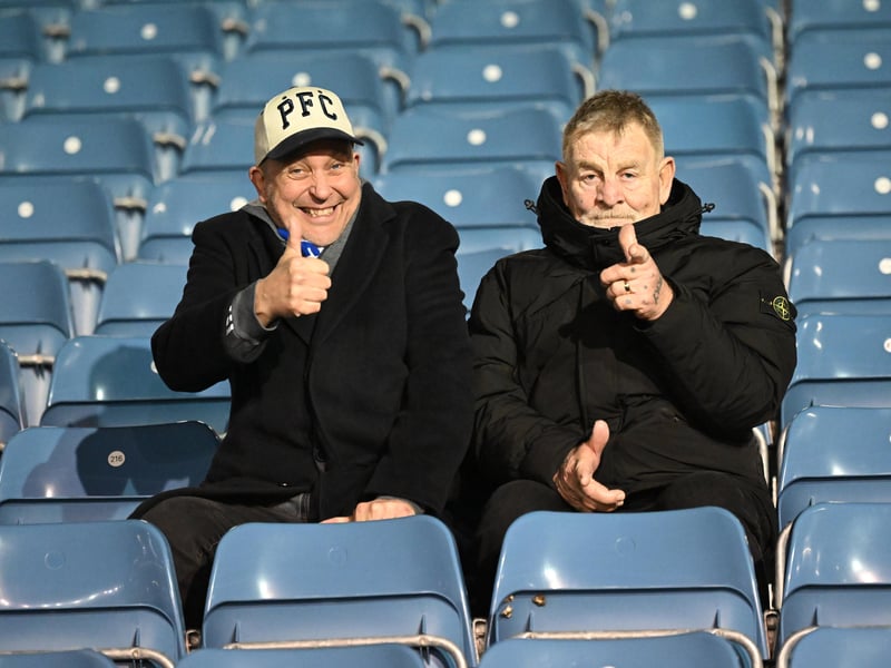 Brilliant photos of Pompey fans under the lights at Fratton Park against Derby County on Monday.