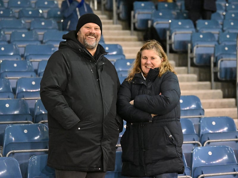 Brilliant photos of Pompey fans under the lights at Fratton Park against Derby County on Monday.