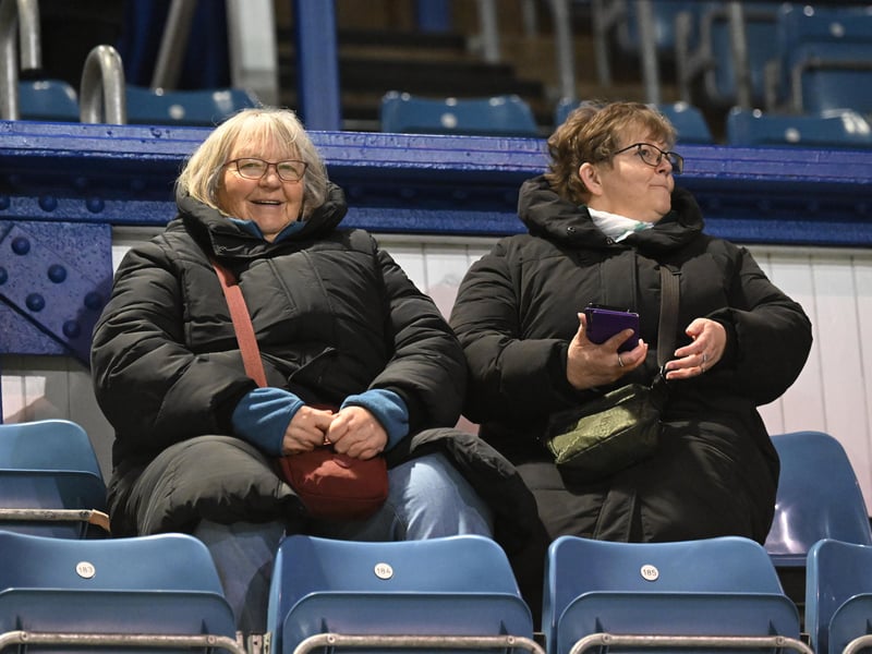 Brilliant photos of Pompey fans under the lights at Fratton Park against Derby County on Monday.