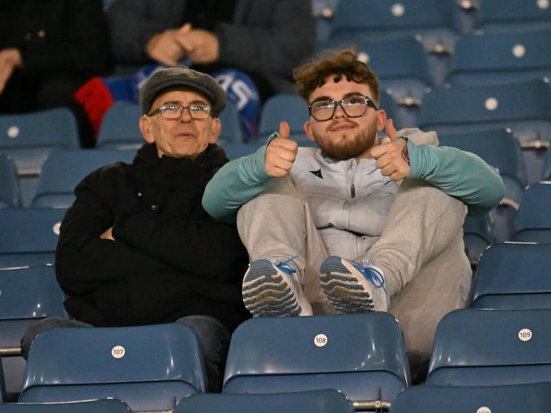 Brilliant photos of Pompey fans under the lights at Fratton Park against Derby County on Monday.