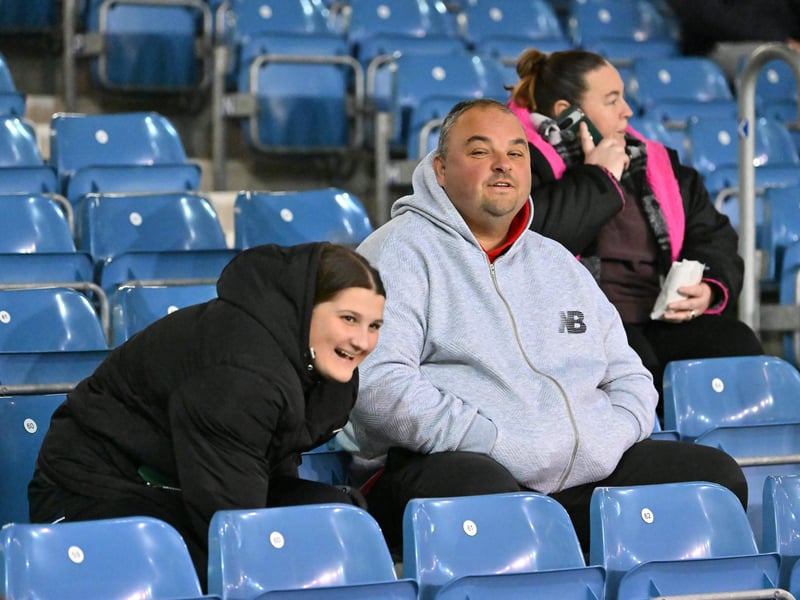 Brilliant photos of Pompey fans under the lights at Fratton Park against Derby County on Monday.