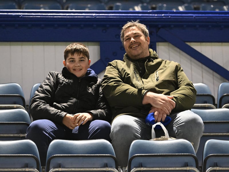 Brilliant photos of Pompey fans under the lights at Fratton Park against Derby County on Monday.