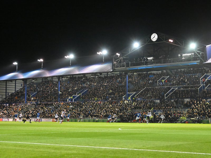 Brilliant photos of Pompey fans under the lights at Fratton Park against Derby County on Monday.