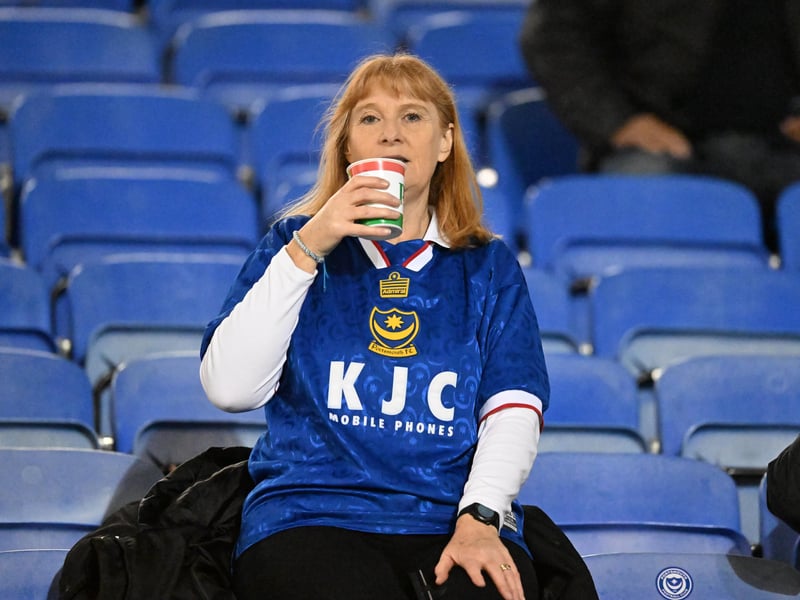 Brilliant photos of Pompey fans under the lights at Fratton Park against Derby County on Monday.
