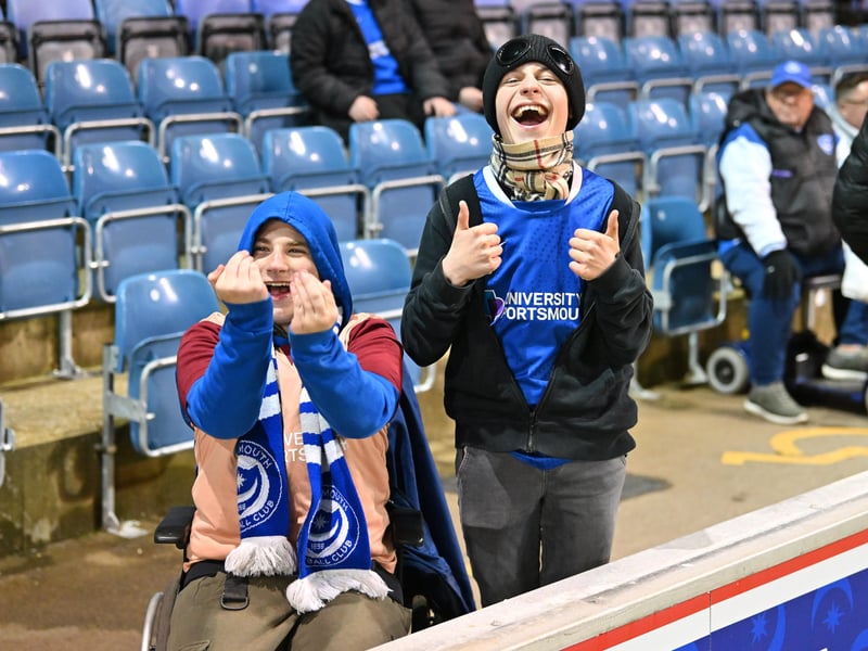 Brilliant photos of Pompey fans under the lights at Fratton Park against Derby County on Monday.