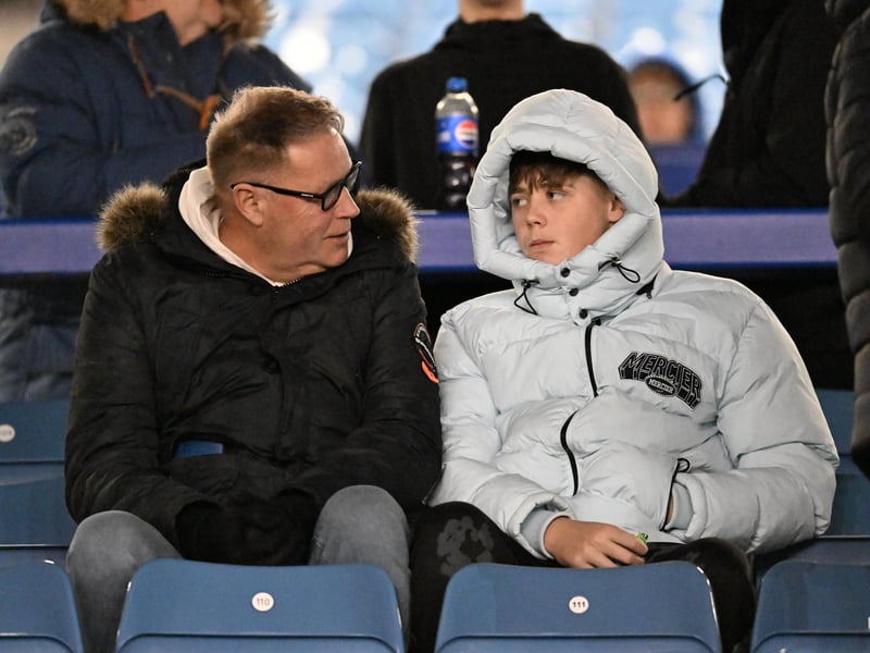 Brilliant photos of Pompey fans under the lights at Fratton Park against Derby County on Monday.