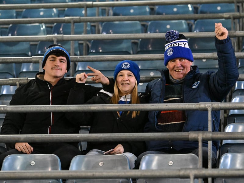 Brilliant photos of Pompey fans under the lights at Fratton Park against Derby County on Monday.