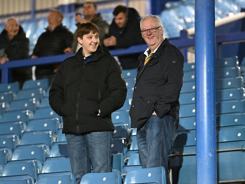 Brilliant photos of Pompey fans under the lights at Fratton Park against Derby County on Monday.