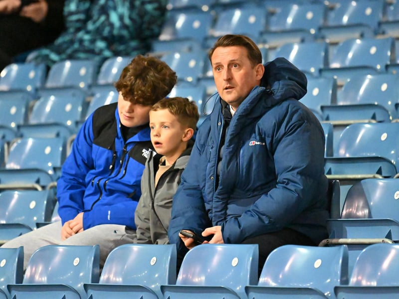 Brilliant photos of Pompey fans under the lights at Fratton Park against Derby County on Monday.