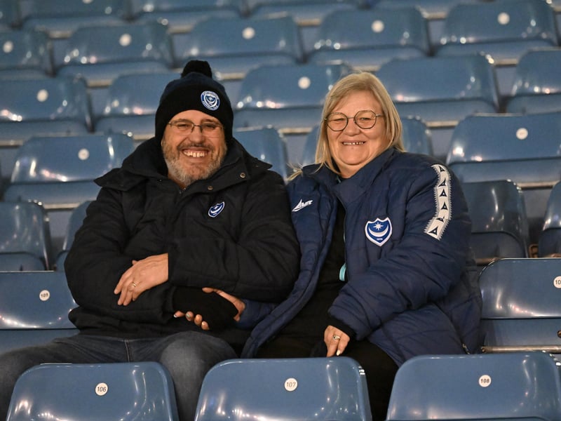 Brilliant photos of Pompey fans under the lights at Fratton Park against Derby County on Monday.