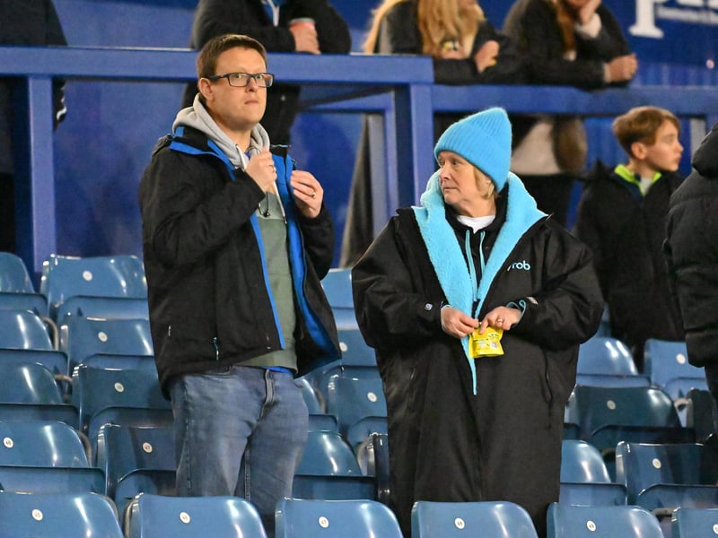 Brilliant photos of Pompey fans under the lights at Fratton Park against Derby County on Monday.