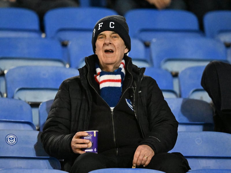 Brilliant photos of Pompey fans under the lights at Fratton Park against Derby County on Monday.