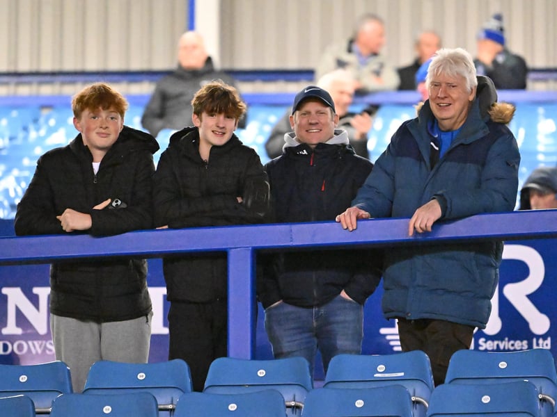 Brilliant photos of Pompey fans under the lights at Fratton Park against Derby County on Monday.
