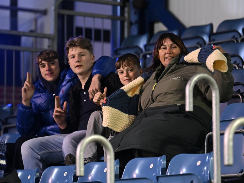 Brilliant photos of Pompey fans under the lights at Fratton Park against Derby County on Monday.