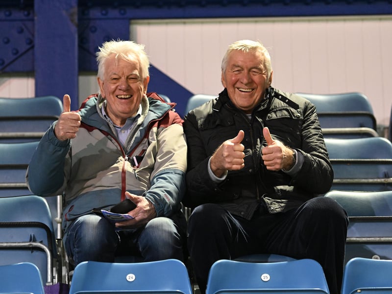 Brilliant photos of Pompey fans under the lights at Fratton Park against Derby County on Monday.