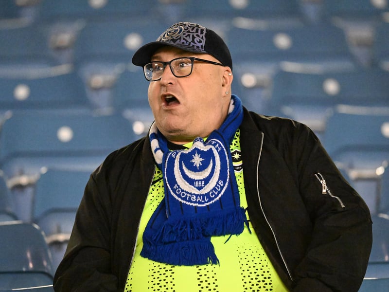 Brilliant photos of Pompey fans under the lights at Fratton Park against Derby County on Monday.