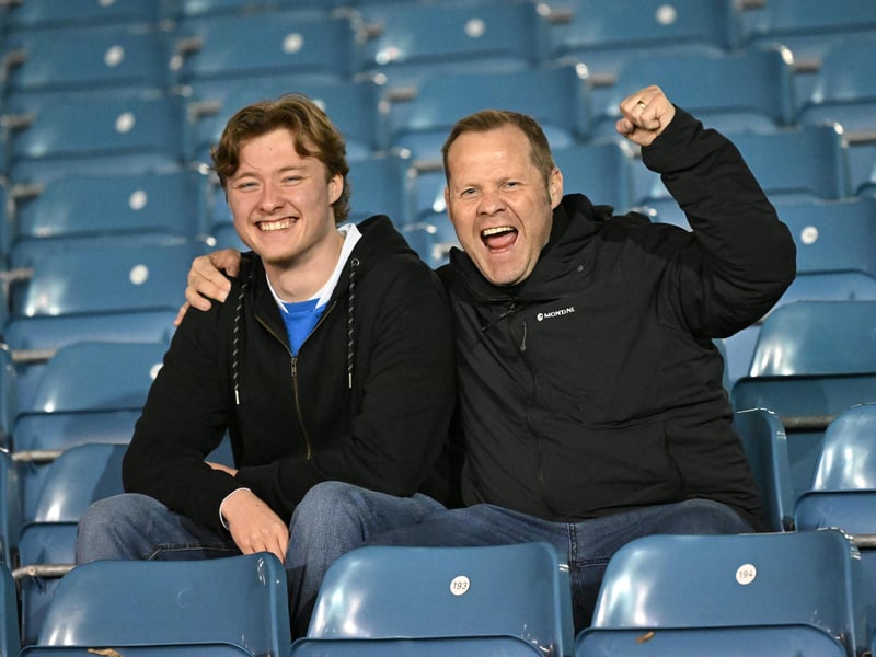 Brilliant photos of Pompey fans under the lights at Fratton Park against Derby County on Monday.