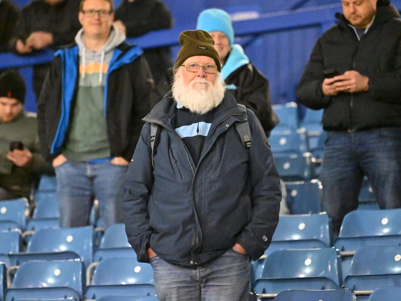 Brilliant photos of Pompey fans under the lights at Fratton Park against Derby County on Monday.