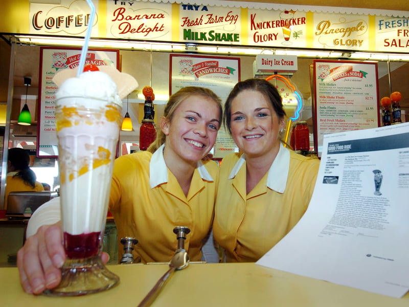 Bar girls Irina Davidkina and Hayley Botham celebrate with a trademark Knickerbocker Glory after The Harbour Bar in Scarborough is named 'Best Ice Cream Parlour' in BMW's Best Food Rides booklet in 2010