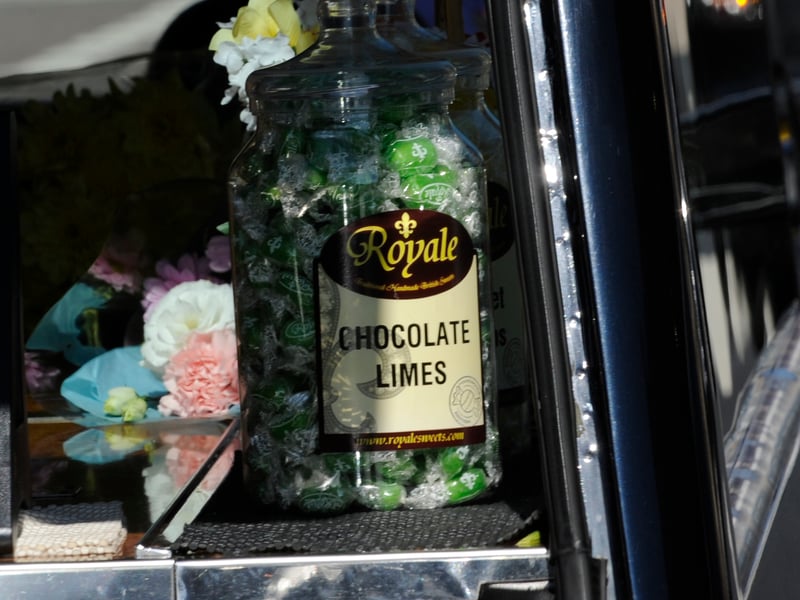 A jar of chocolate lime sweets in the hearse next to Ray King's coffin 