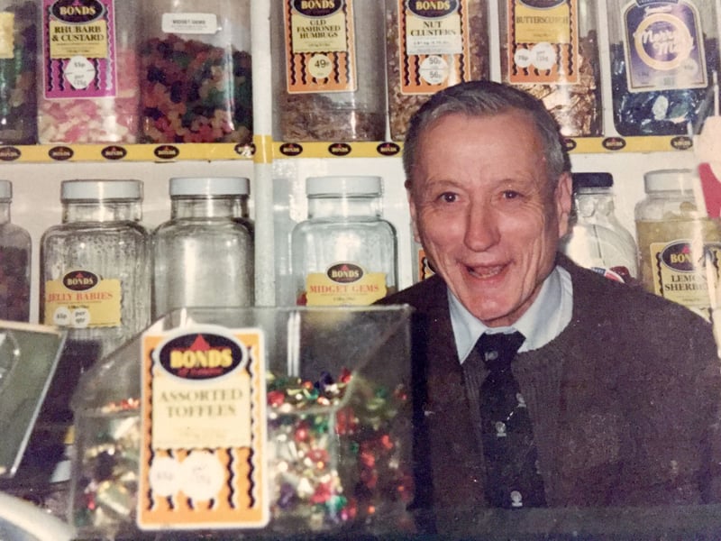 Ray King in his sweet shop H & E King