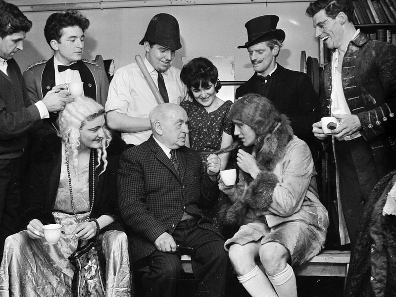 Mr Stanley Nairn - President of the North Merchiston Boys Club - chats with members of the cast of the club's pantomime 'Cinderella' in December 1964.