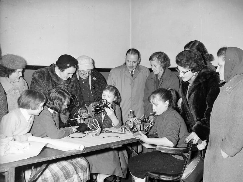 Girls at handicraft class making flower baskets during a parent's night at North Merchiston Youth Club in March 1960.